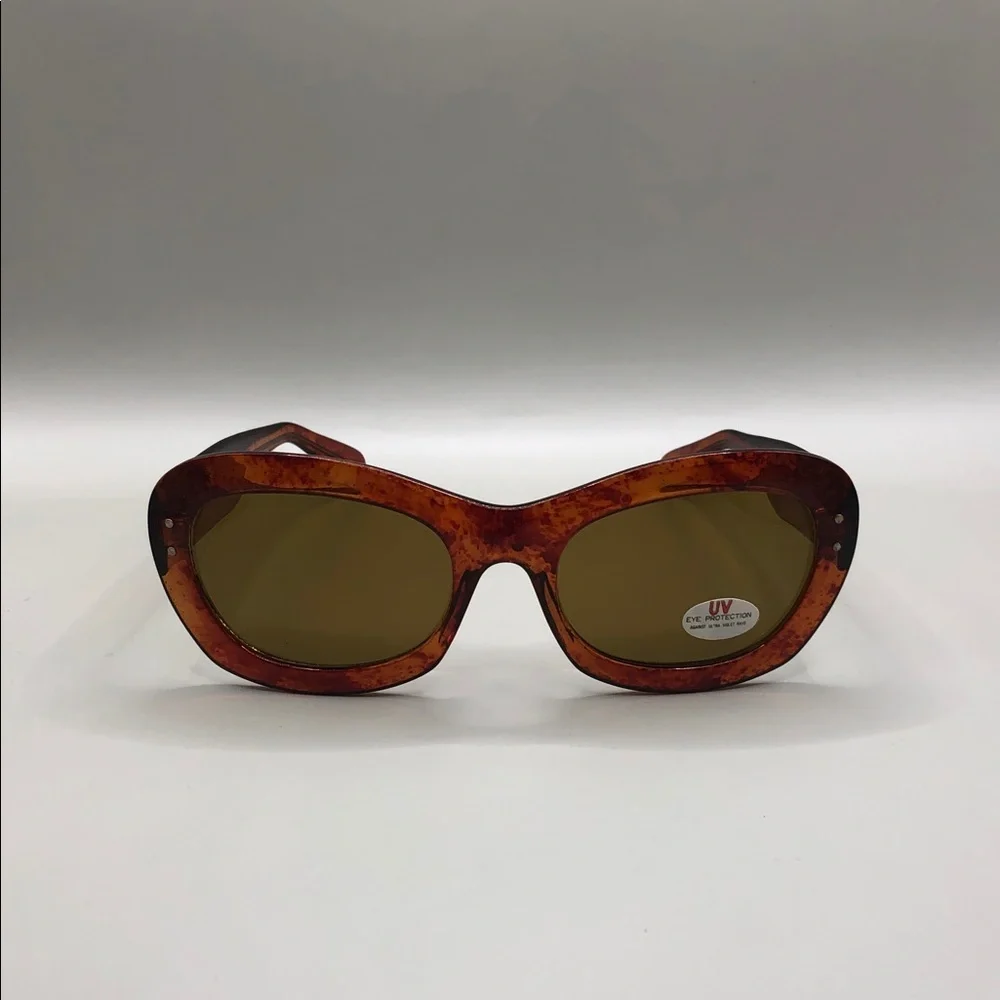 Vintage 80's 90's brown amber color semi oversized butterfly sunglasses.